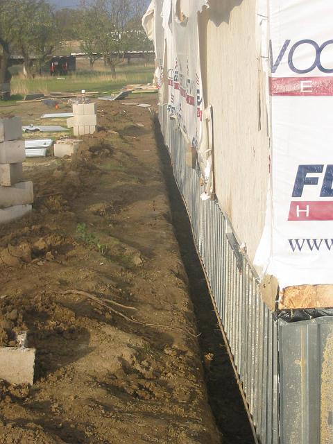 Stucco 2 Panels have been hung from a couple of homes that will get a one-coat stucco over each home and foundation wall.